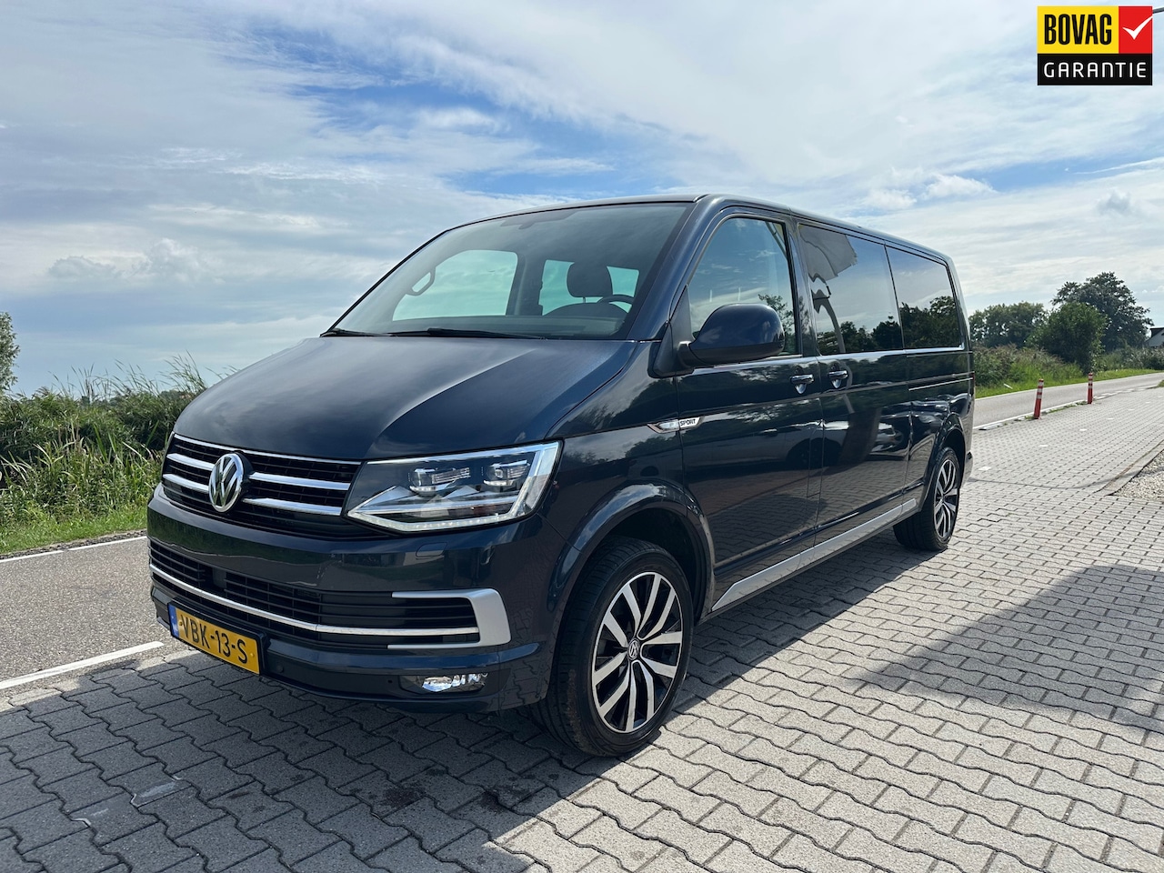 Volkswagen Transporter - 2.0 TDI L2H1 DC Highline 2.0 TDI L2H1 DC Highline, 2x Schuifdeur, LED, Adaptive Cruise, Carplay, Camera, Stoel + Vo - AutoWereld.nl