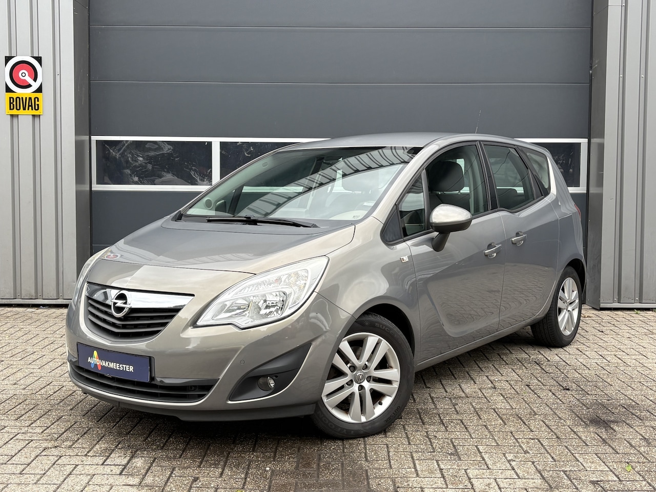 Opel Meriva - 1.4 Cosmo | Navi | PDC | Cruise & Climate Control | All Season | Interesse? Bel of App naa - AutoWereld.nl