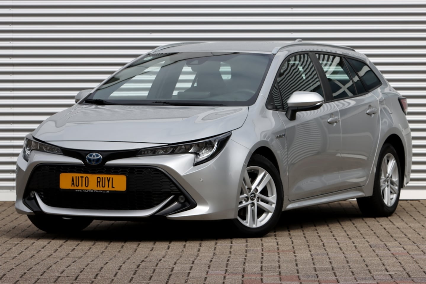 Toyota Corolla Touring Sports - 1.8 Hybrid Business Navi / Camera / PDC - AutoWereld.nl