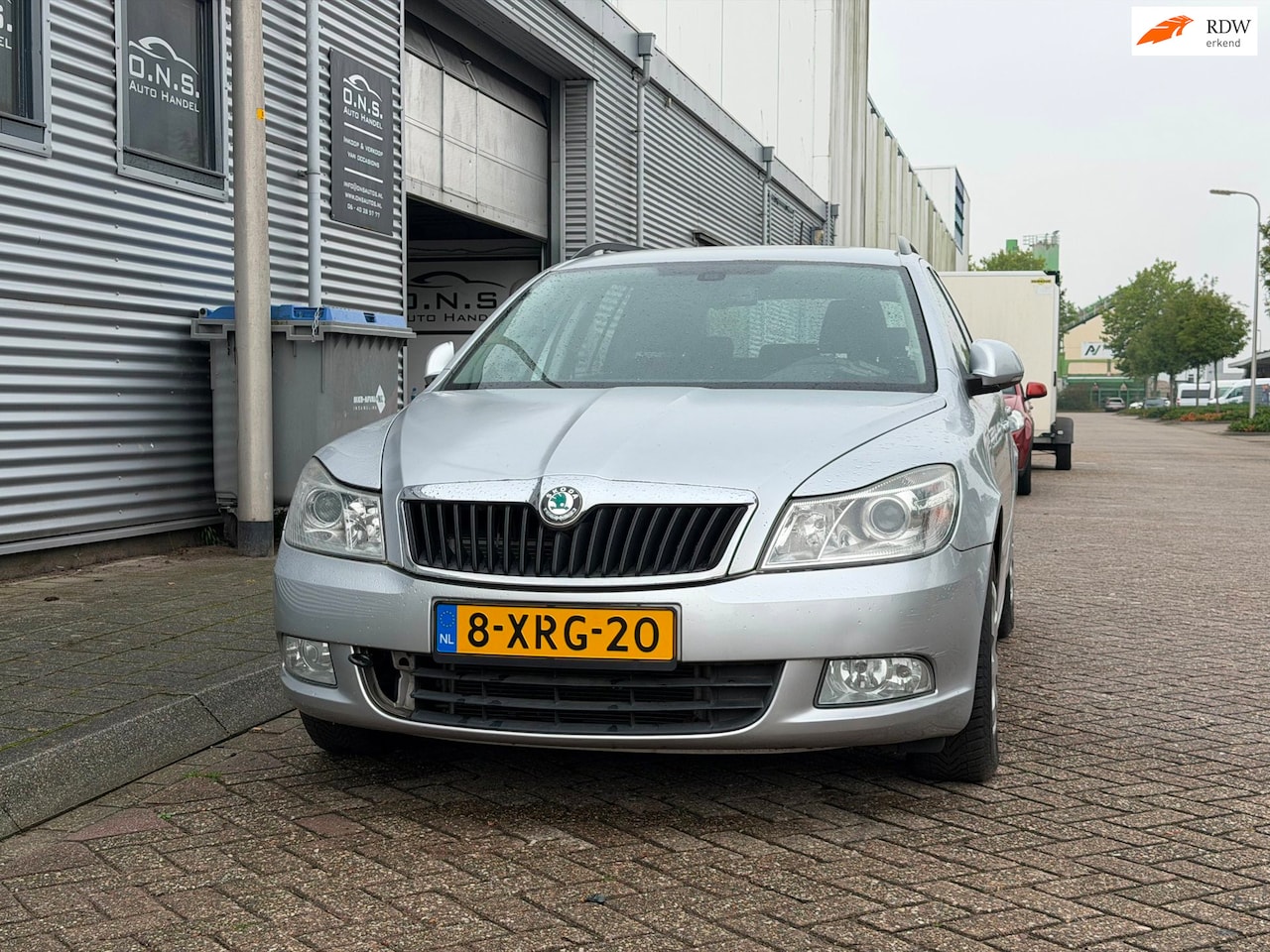 Skoda Octavia Combi - 1.6 TDI Ambition 2012 Automaat D-riem Geknapt - AutoWereld.nl
