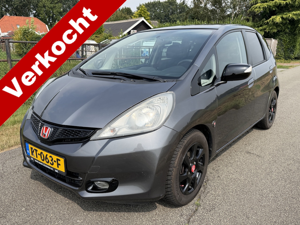 Honda Jazz - 1.4 Comfort Plus ECC/CRUISE/LMV/ 109.000km!! - AutoWereld.nl