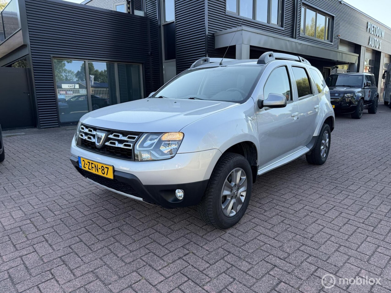 Dacia Duster - 1.2 TCe 4x2 Prestige Airco Navigatie Trekh Nap - AutoWereld.nl