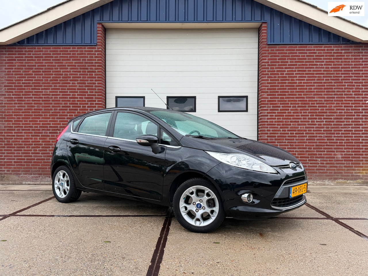 Ford Fiesta - 1.25 Titanium PDC Climatew control Cruise Control Mulimedia - AutoWereld.nl