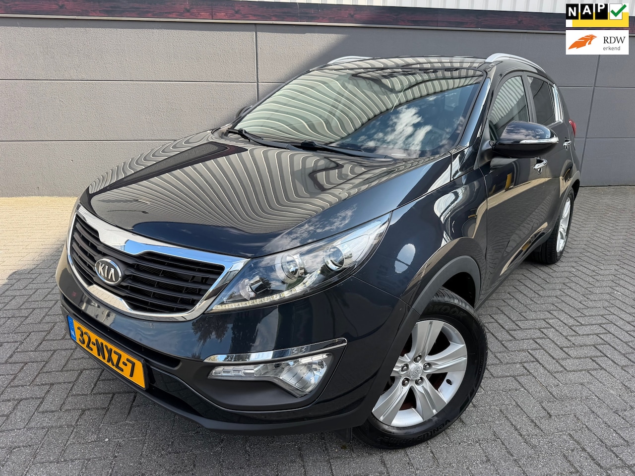 Kia Sportage - 2.0 X-ecutive Plus Pack*1eEigenaar*Automaat*Cruise*Park-Sensoren*Climat-Airco*NAP - AutoWereld.nl