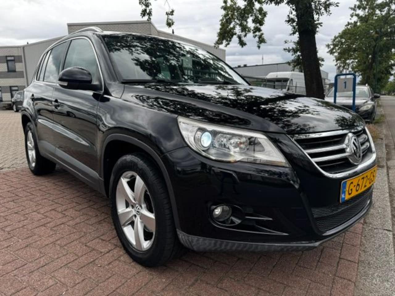 Volkswagen Tiguan - 1.4 TSI 150pk Trend&Fun 4Motion Airco/ECC,Cruisecontrol,Panoramadak - AutoWereld.nl