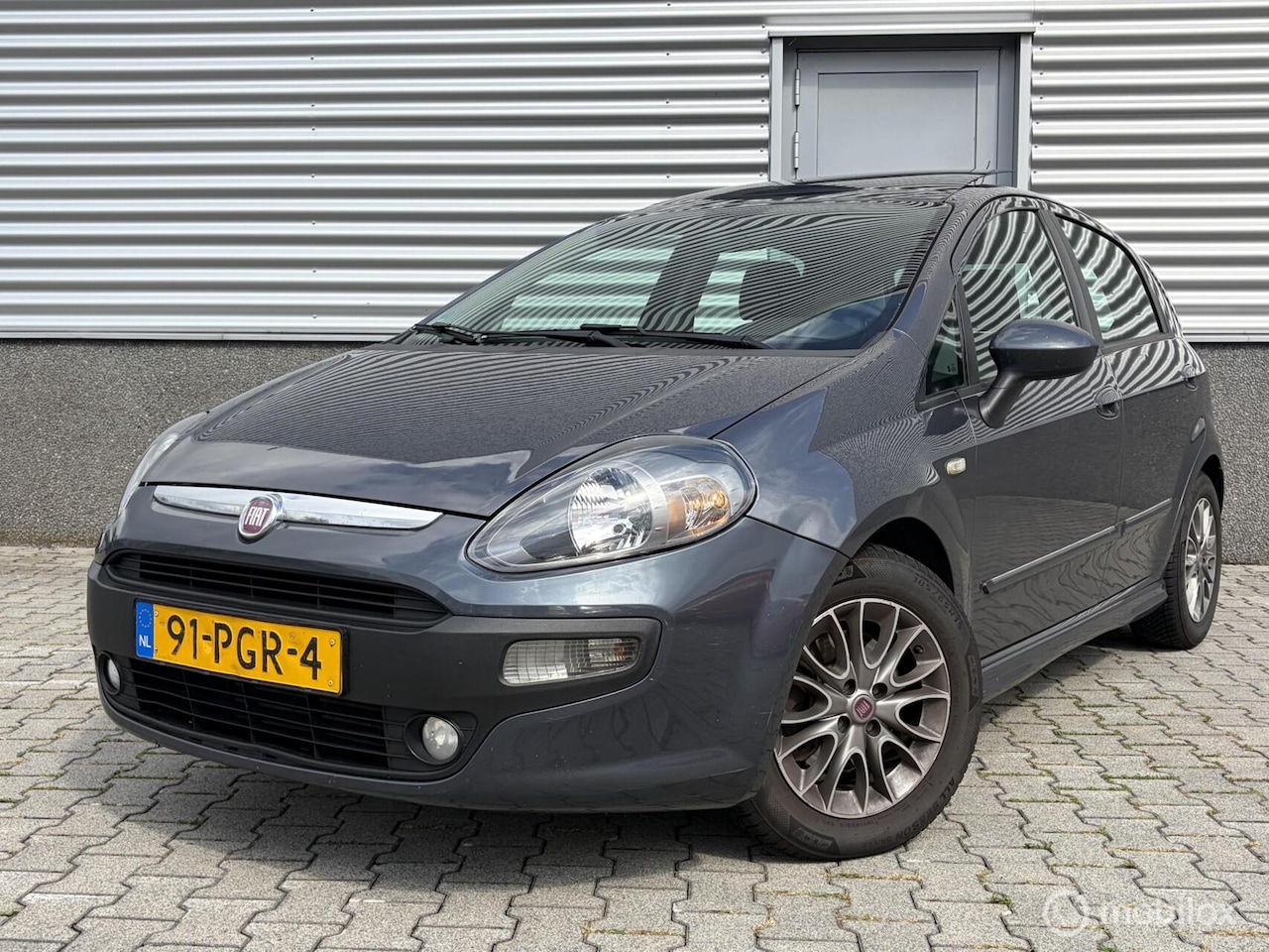 Fiat Punto Evo - 1.3 M-Jet Dynamic Pano-Airco-Cruise - AutoWereld.nl