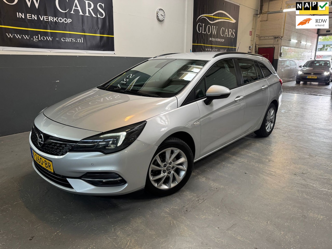 Opel Astra Sports Tourer - 1.2 Edition |AIRCO|TREKHAAK|NAVI|CAMERA - AutoWereld.nl