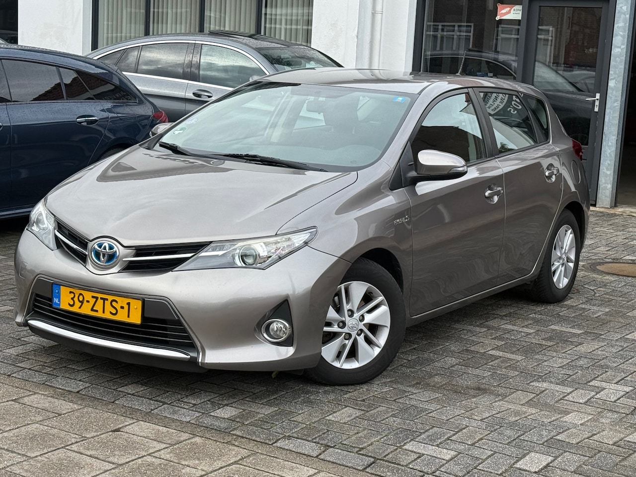 Toyota Auris - 1.8 Hybrid Aspiration 1.8 Hybrid Aspiration, Trekhaak,Cruise control,Navigatie,Achteruitrij camera,Climate contr - AutoWereld.nl