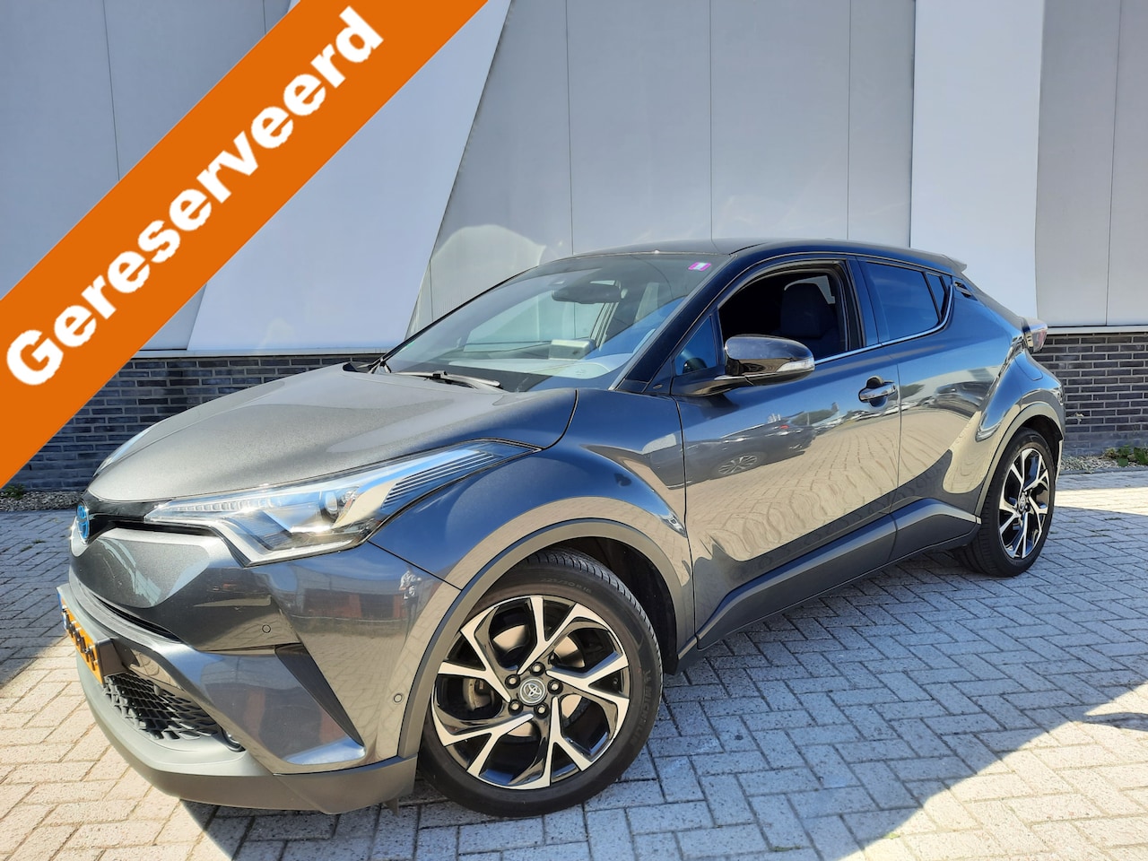 Toyota C-HR - 1.8 Hybrid Bi-Tone met Premium Pack Navi ECC Dode hoek detectie Stoelverw PDC v+a - AutoWereld.nl