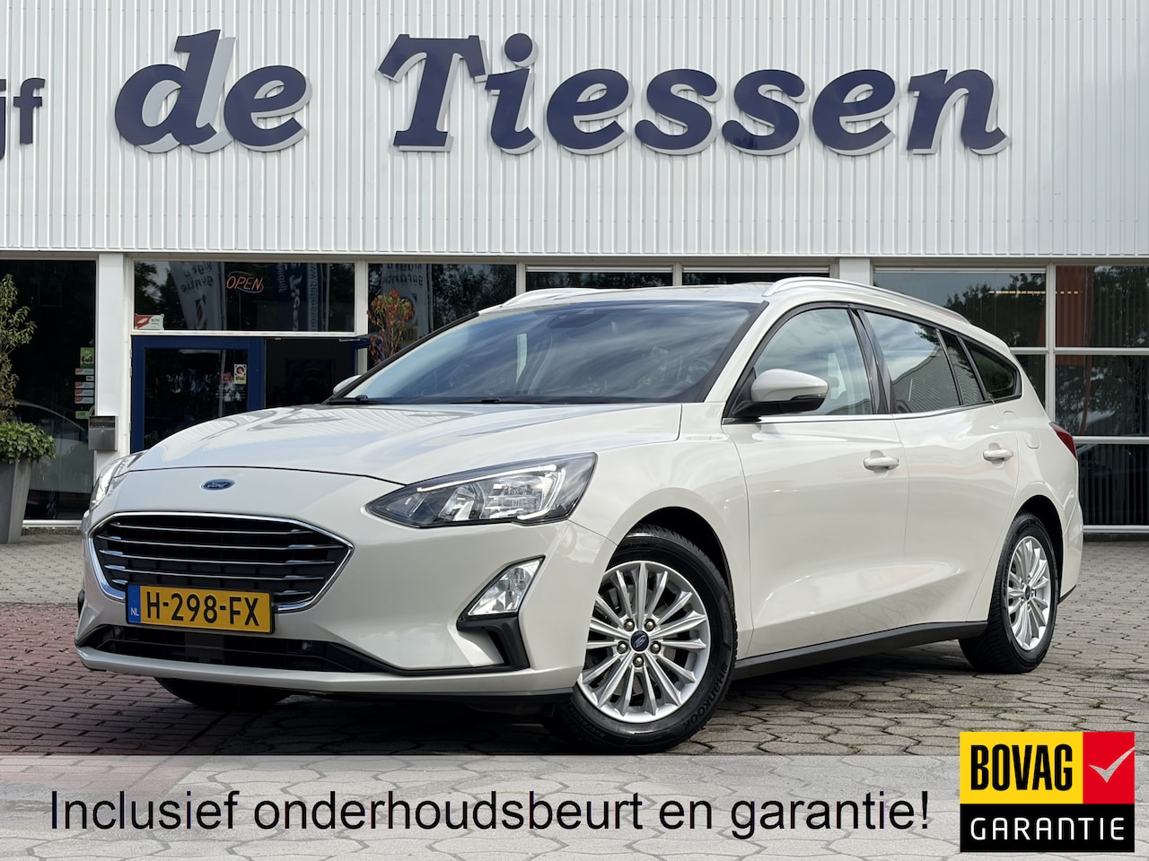 Ford Focus Wagon - 1.0 EcoBoost Titanium Business | PDC | Navi | Trekhaak | Carplay | Rijklaar met beurt & ga - AutoWereld.nl