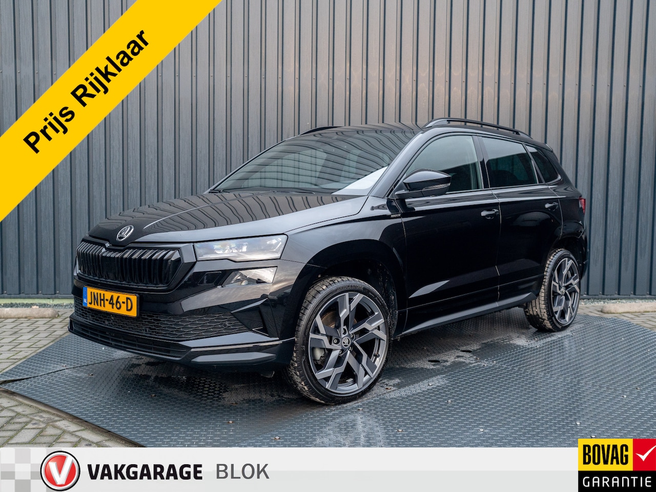 Skoda Karoq - 1.5 TSI ACT Sportline Business | Elk. A- Klep | Camera | 19'' | Adapt. Cr. | Keyless | Sto - AutoWereld.nl