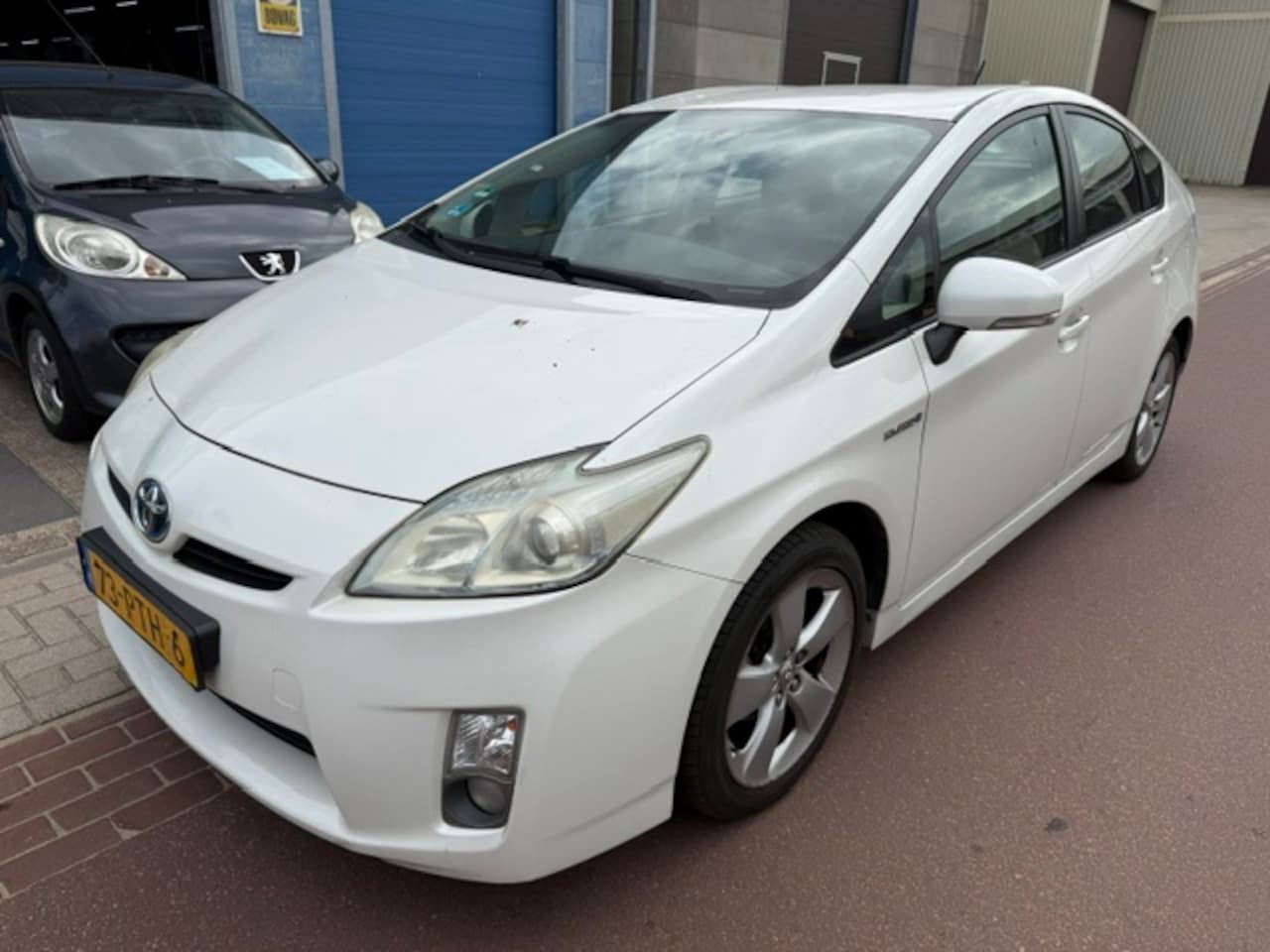 Toyota Prius - 1.8 Dynamic 2011 Navigatie NAP 279.673km Fijne Prius met boekjes en losse rekeningen. - AutoWereld.nl