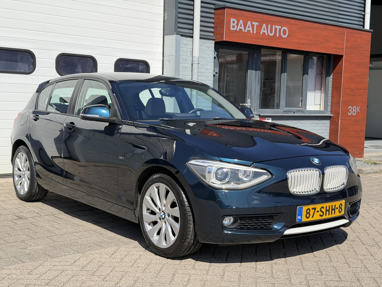 BMW 1-serie - 116i Business Urban line NW APK Xenon Halfleder Navi - AutoWereld.nl