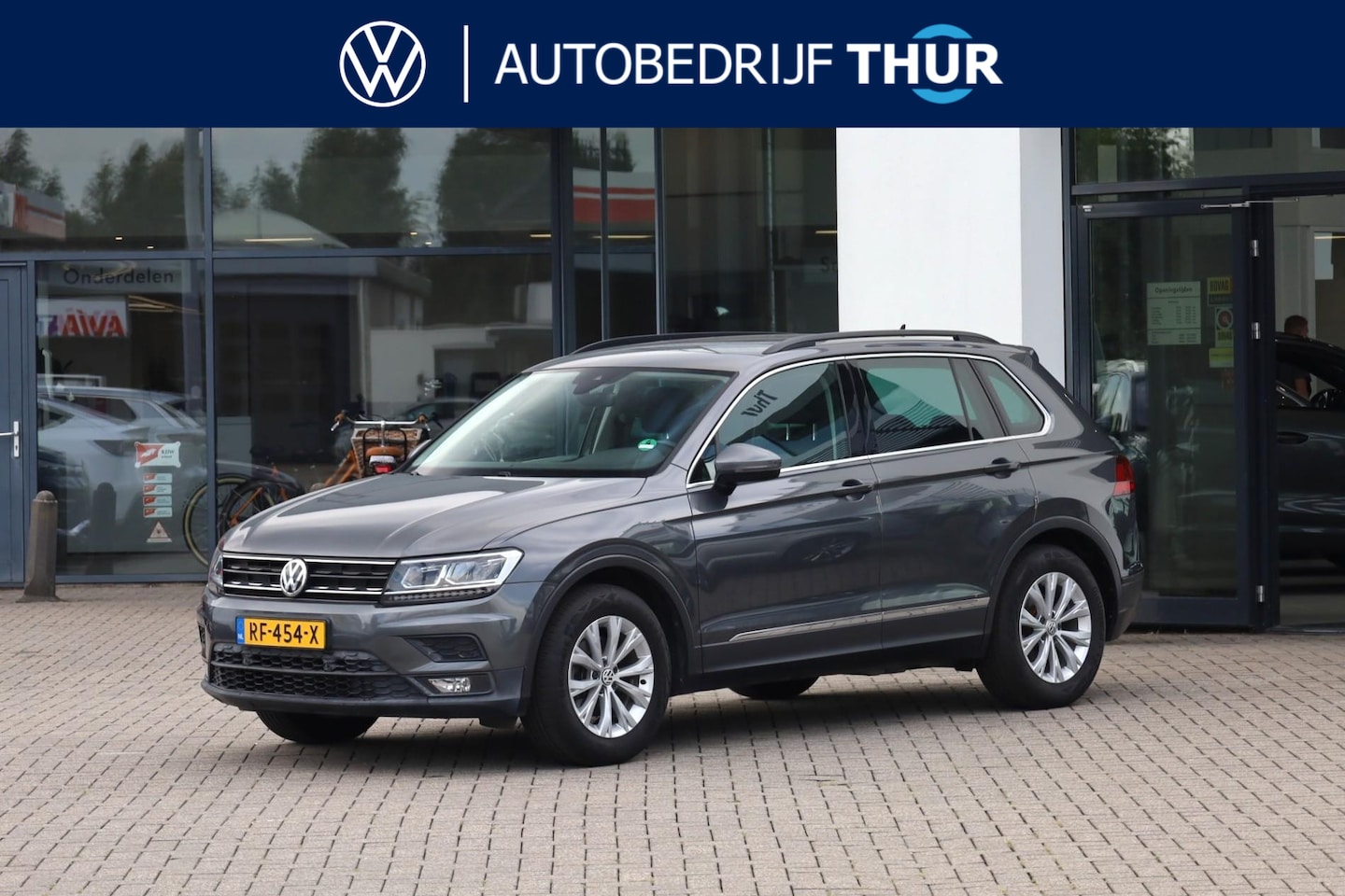 Volkswagen Tiguan - 1.4 TSI Comfortline 1.4 TSI Comfortline 125PK / 92kW, Navigatie, trekhaak, 3-zone climatronic, parkeersensoren - AutoWereld.nl