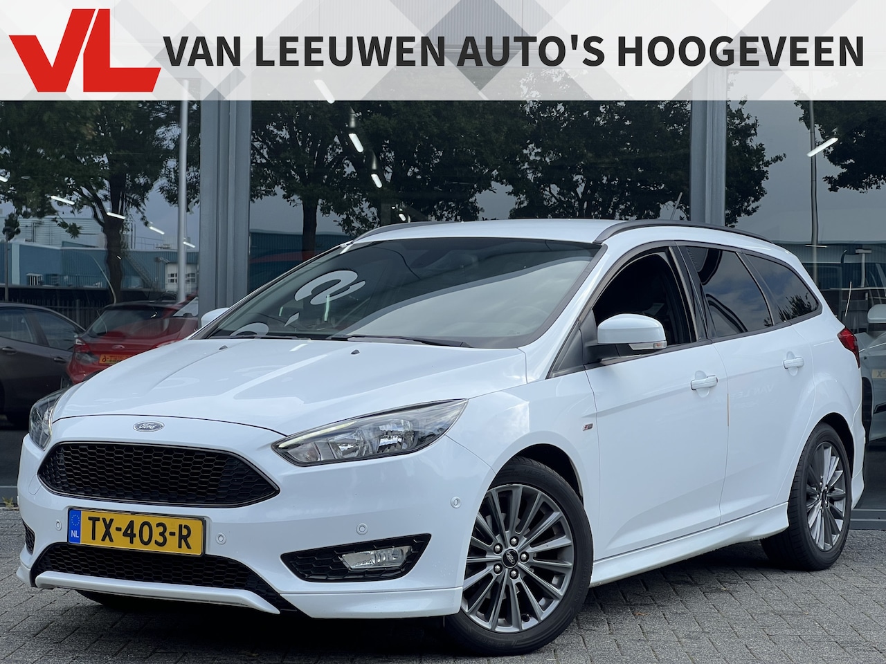 Ford Focus Wagon - 1.0 ST-Line | Stoel- en stuurverwarming | Navi | PDC | 141 PK - AutoWereld.nl