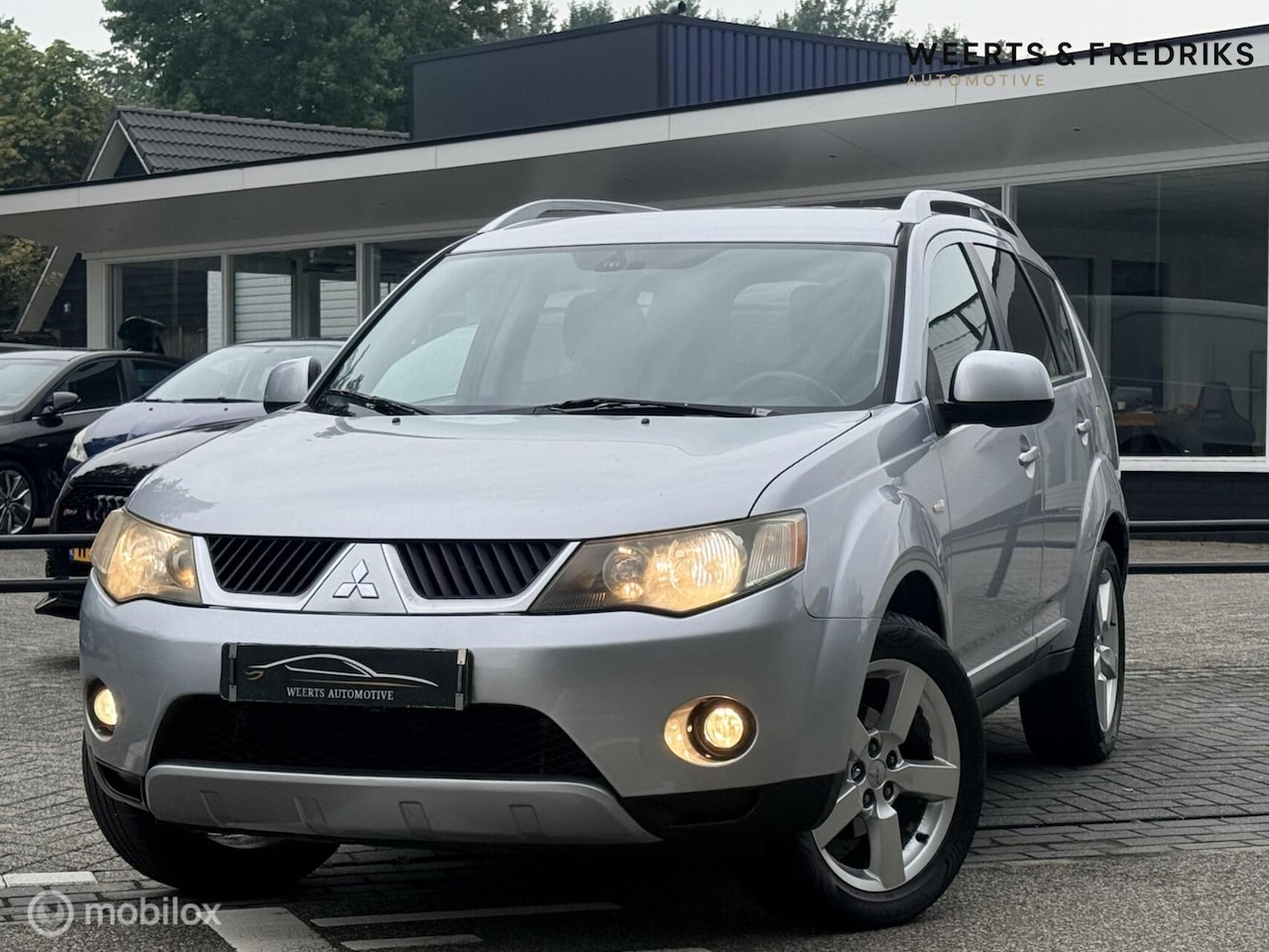 Mitsubishi Outlander - 2.4 Intense+ |4WD|7-persoons|NAP|APK - AutoWereld.nl