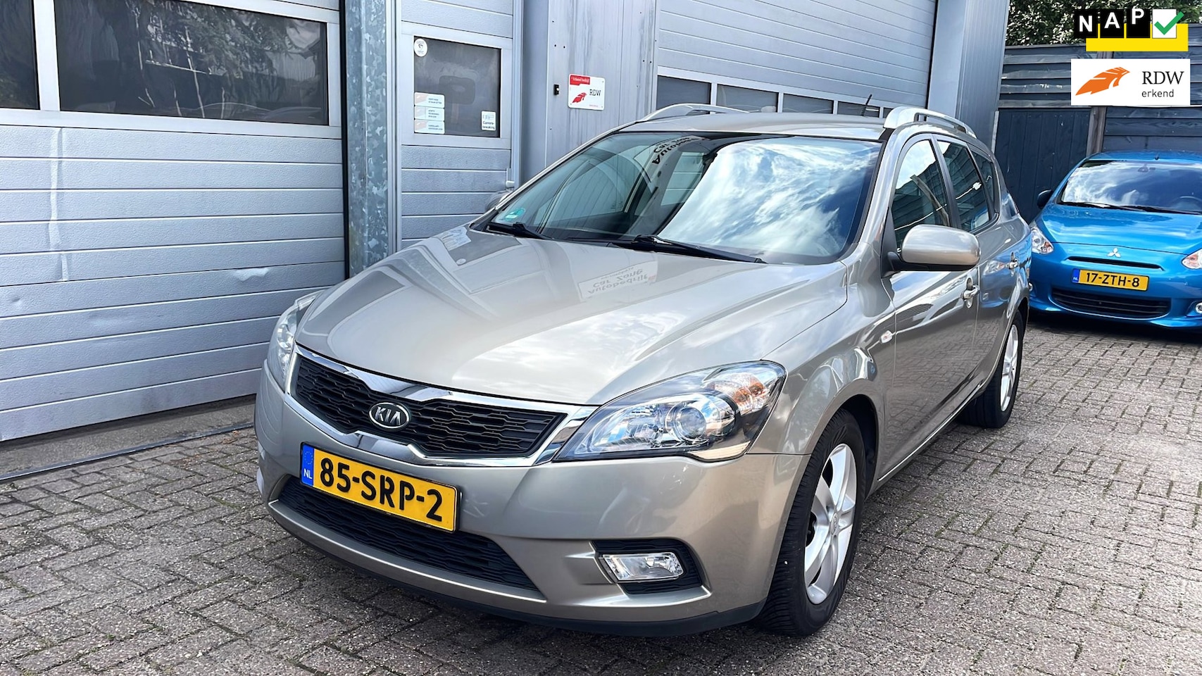 Kia Cee'd Sporty Wagon - 1.4 CVVT Navigator-Navi-Clima-Cruise - AutoWereld.nl