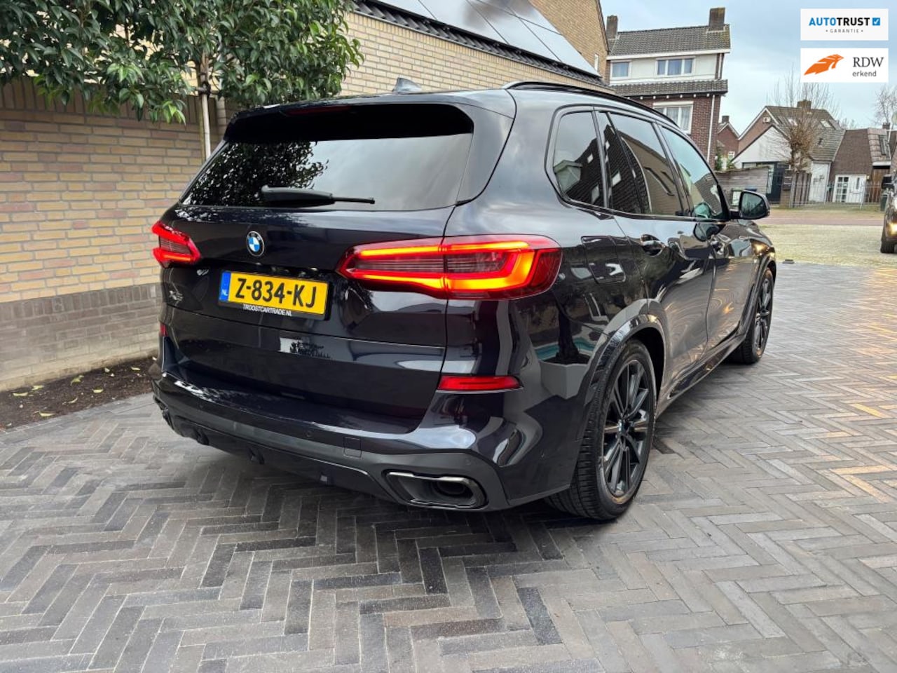 BMW X5 - XDrive45e Carbon zwart M-pakket PANORAMA 394 pk - AutoWereld.nl