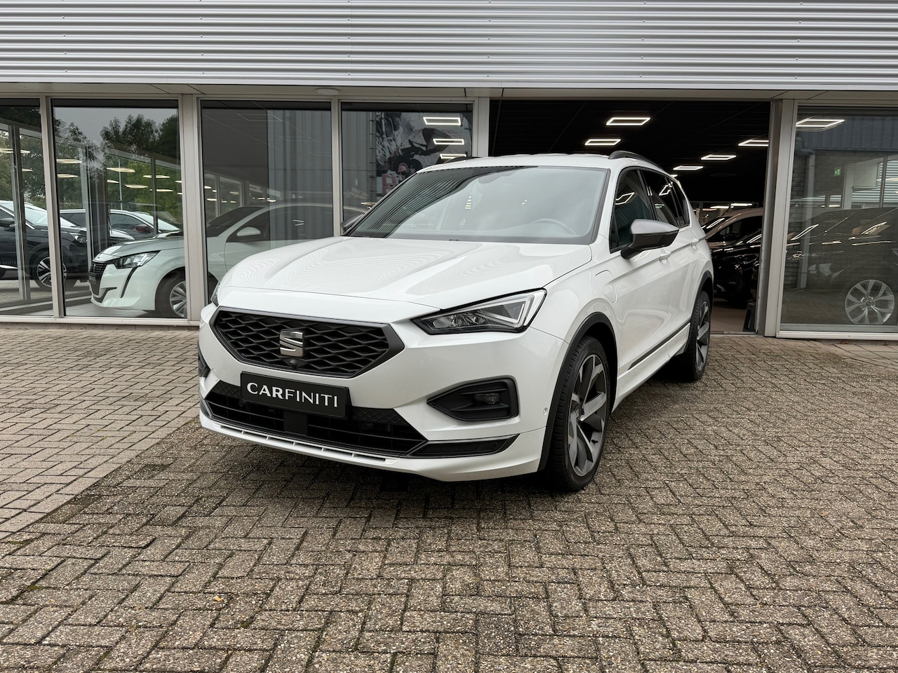 SEAT Tarraco - 1.4 TSI eHybrid PHEV FR | Navigatie | Climate | ACC | 360 Camera | Keyless |Sportstoelen | - AutoWereld.nl