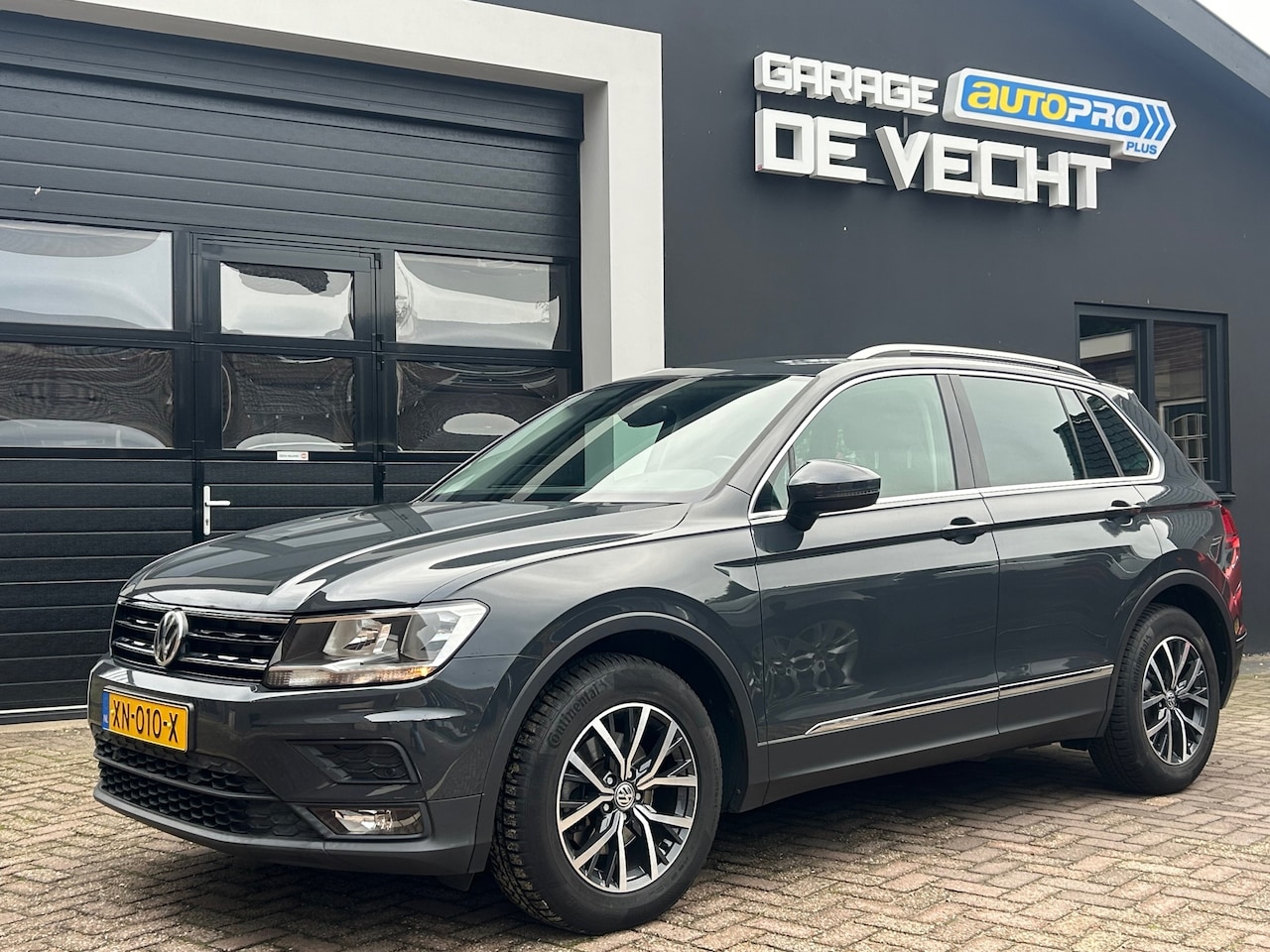 Volkswagen Tiguan - 1.5 TSI Comfortline Business Navi/Carplay/Trekhaak - AutoWereld.nl
