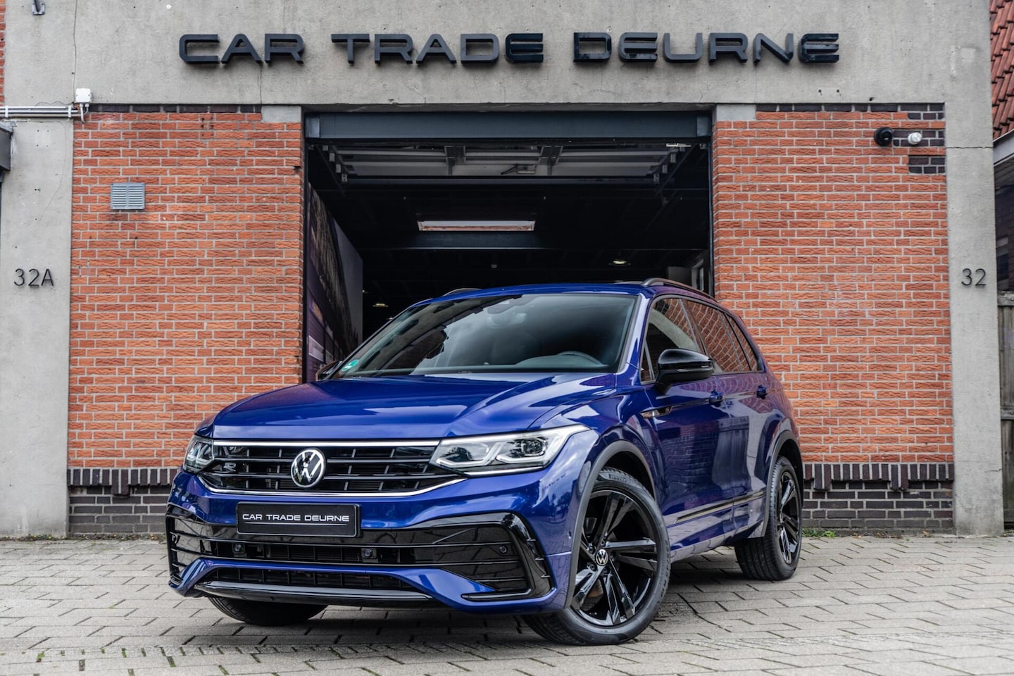 Volkswagen Tiguan - 1.5 TSI R-Line Pano / Trekhaak / Camera - AutoWereld.nl
