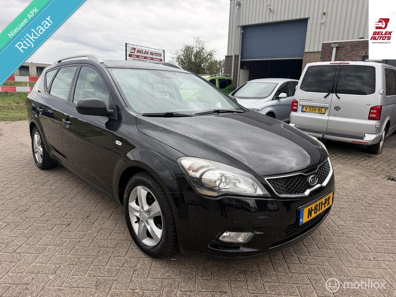 Kia Cee'd Sporty Wagon - 1.4 CVVT X-ecutive 1.4 CVVT X-ecutive - AutoWereld.nl