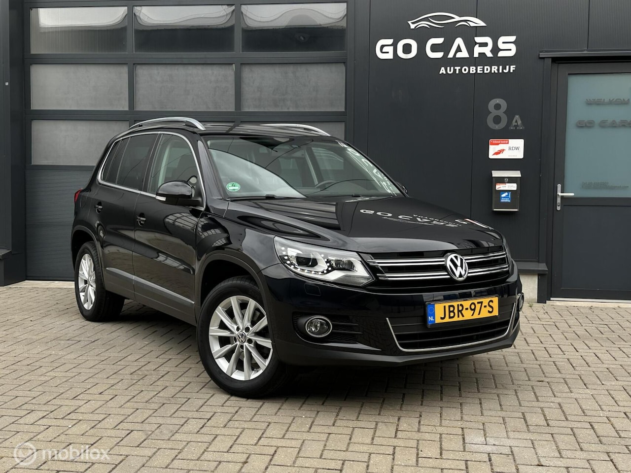 Volkswagen Tiguan - 1.4 TSI Sport&Style Carplay. - AutoWereld.nl