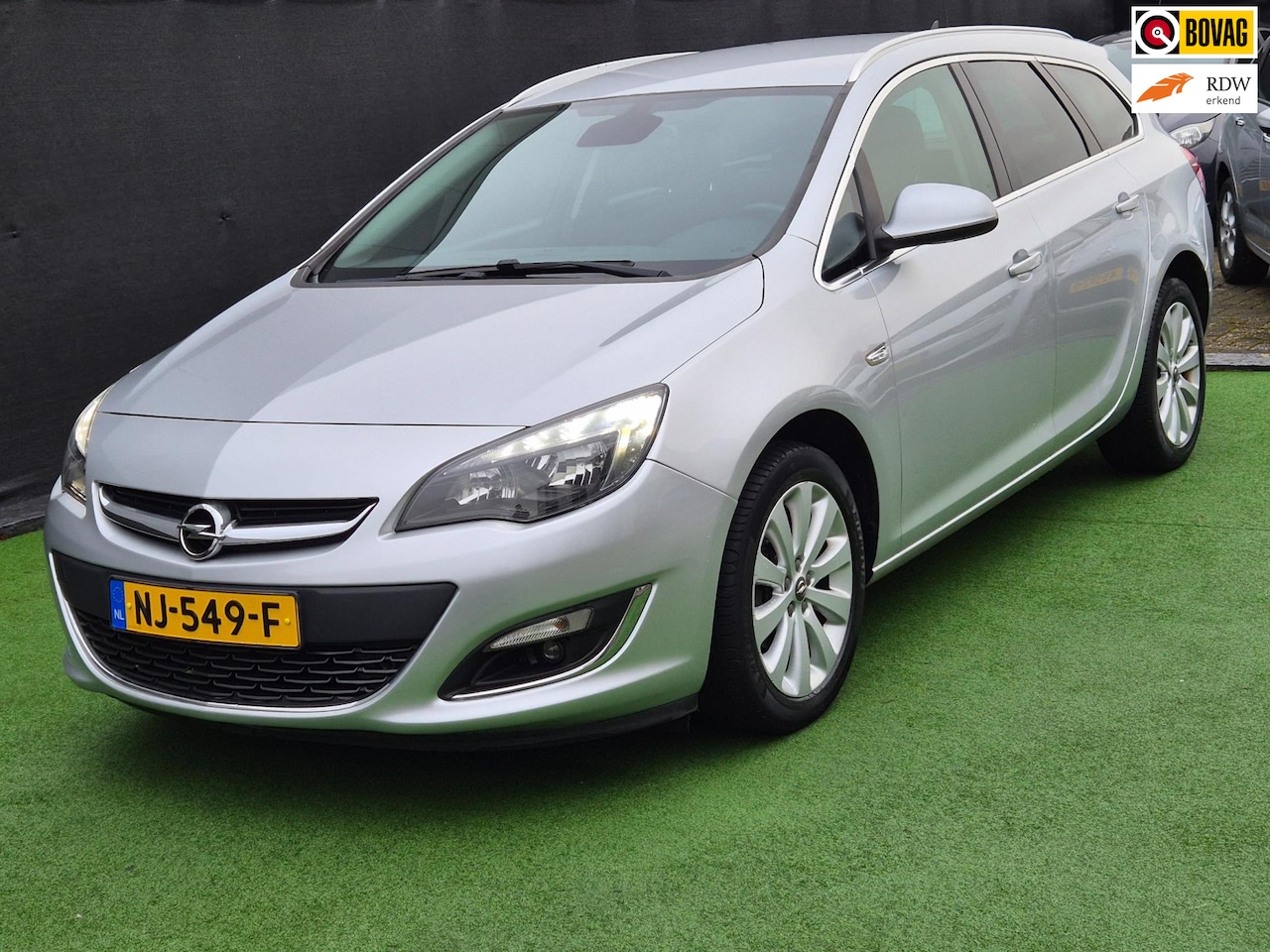 Opel Astra Sports Tourer - 1.4 Edition NAVI LMV! - AutoWereld.nl
