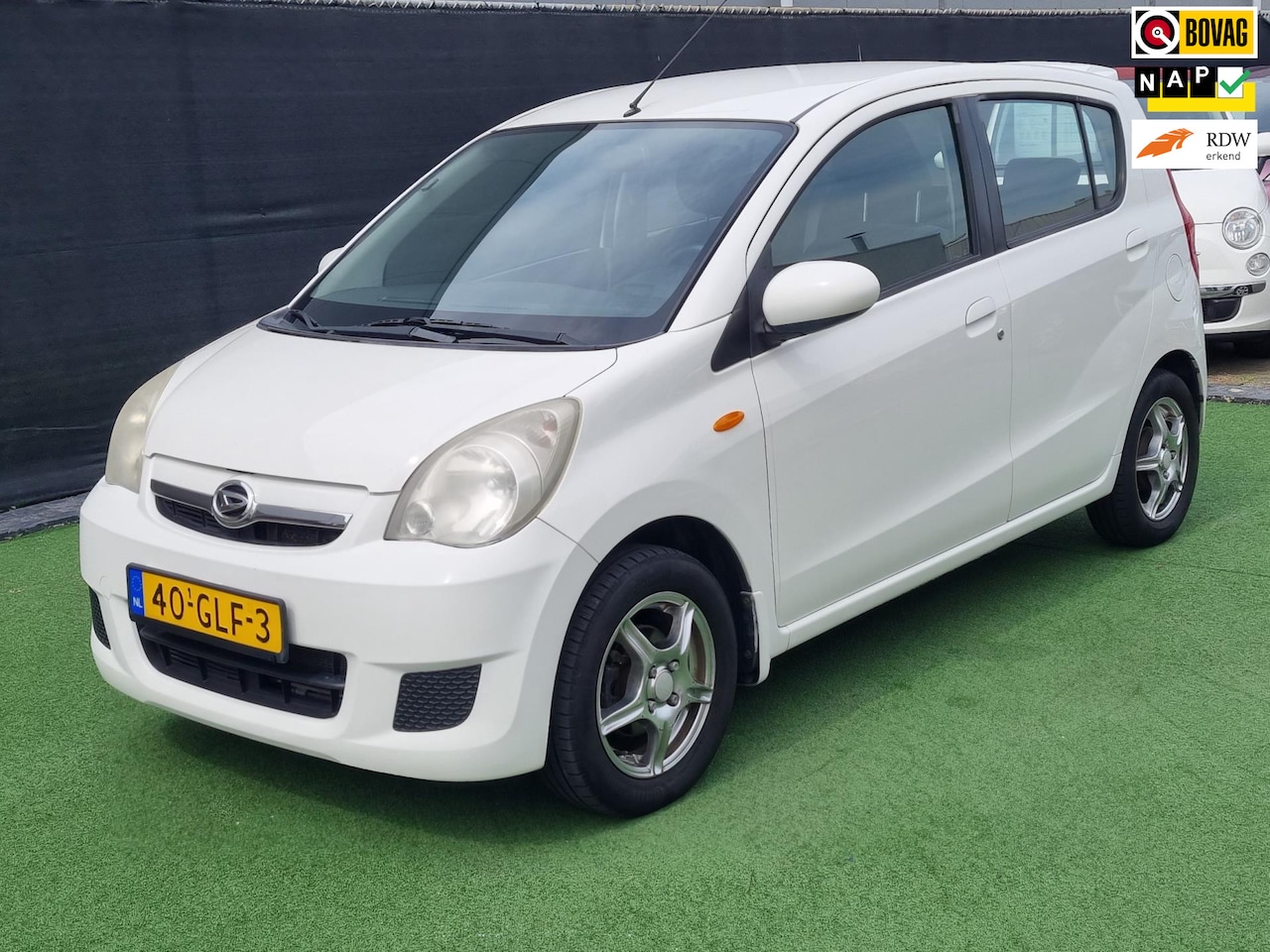 Daihatsu Cuore - 1.0 Premium NAP! - AutoWereld.nl