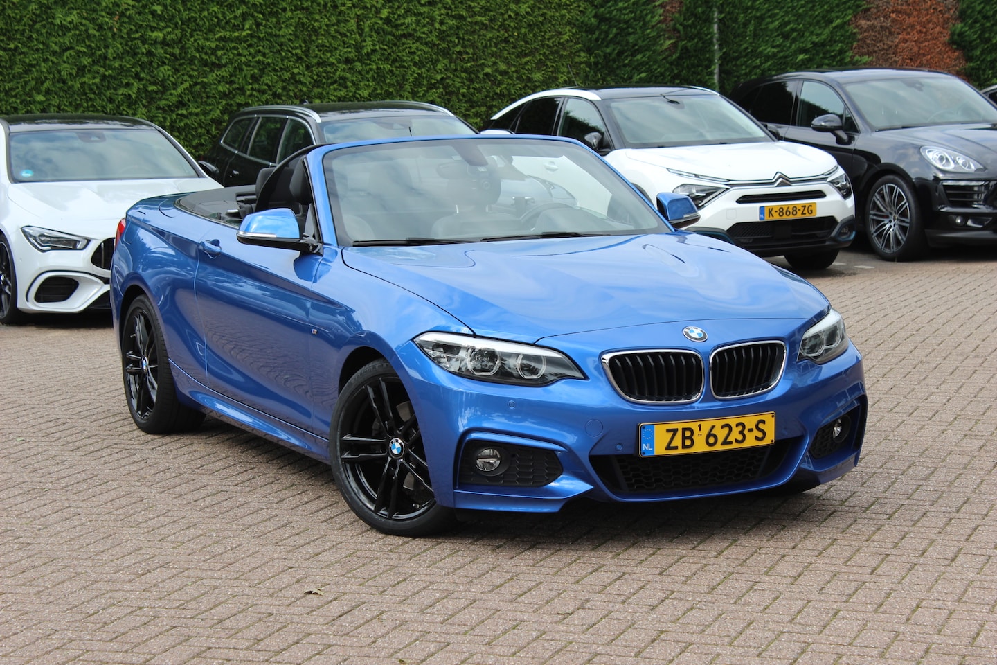 BMW 2-serie Cabrio - 220i High Exe. M Sport / 54.228 km/ NL Auto / Leder / CarPlay / Parkeerhulp V+A / 18'' / W - AutoWereld.nl