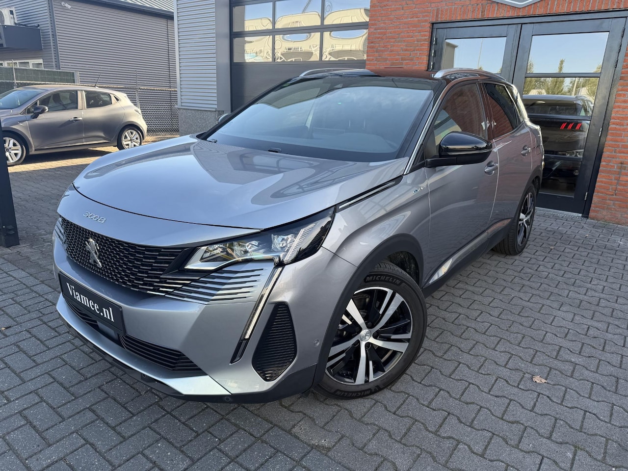 Peugeot 3008 - 1.6 HYbrid4 300 GT Avantage | SOH 89,5% | Adaptieve CC + Stuurhulp | Camera en perfect ond - AutoWereld.nl
