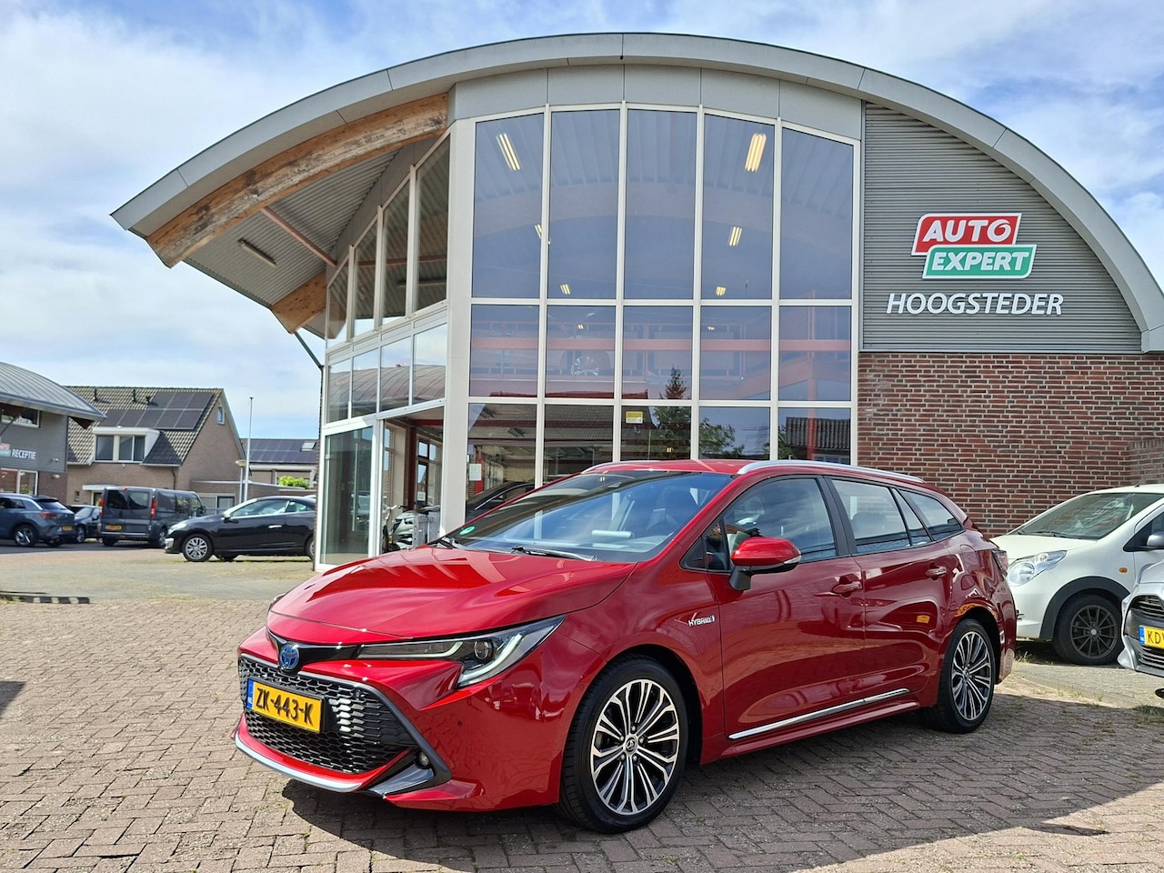 Toyota Corolla Touring Sports - 1.8 Hybrid Style carplay|camera|trekhaak,cruise - AutoWereld.nl