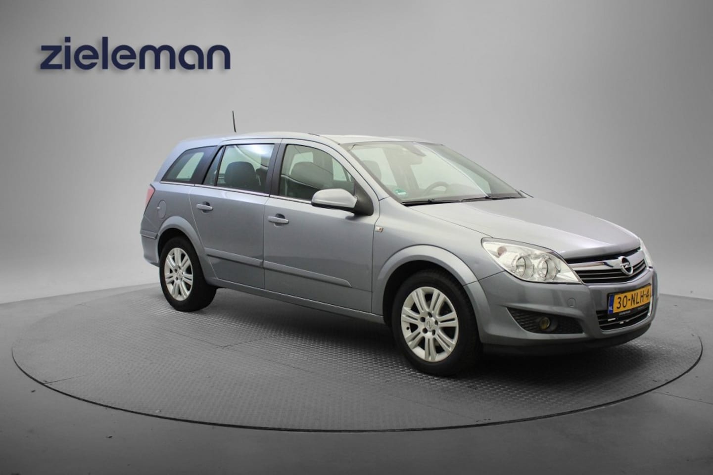 Opel Astra Wagon - 1.6 Cosmo - Cruise, Clima, Half Leer, Trekhaak - AutoWereld.nl