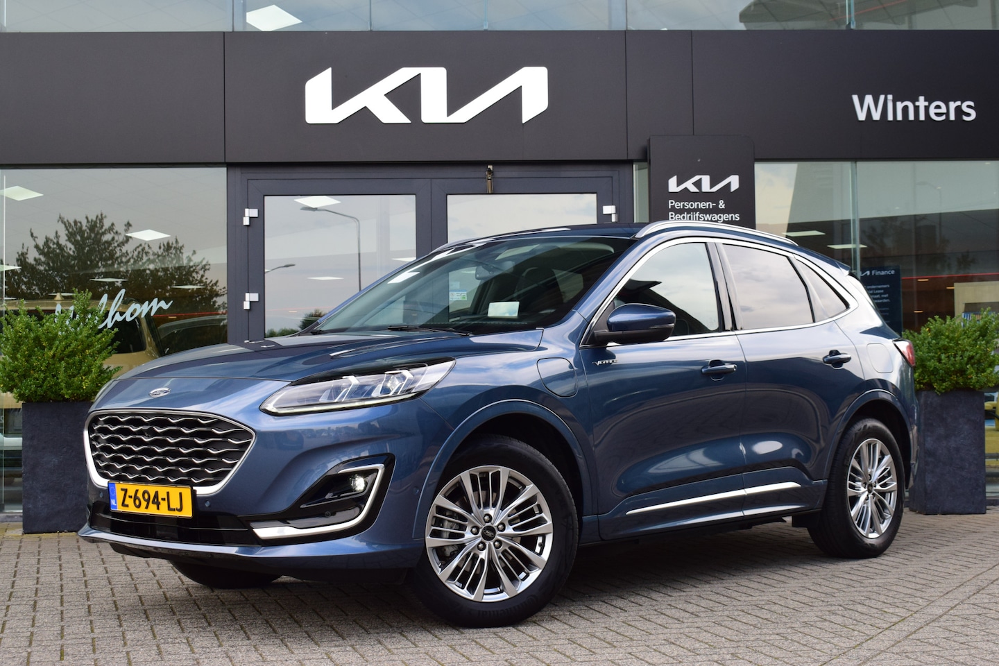 Ford Kuga - 2.5 PHEV Vignale | Trekhaak Elektrisch | Memory | Head-up Display | Leder | Dodehoek | Ele - AutoWereld.nl