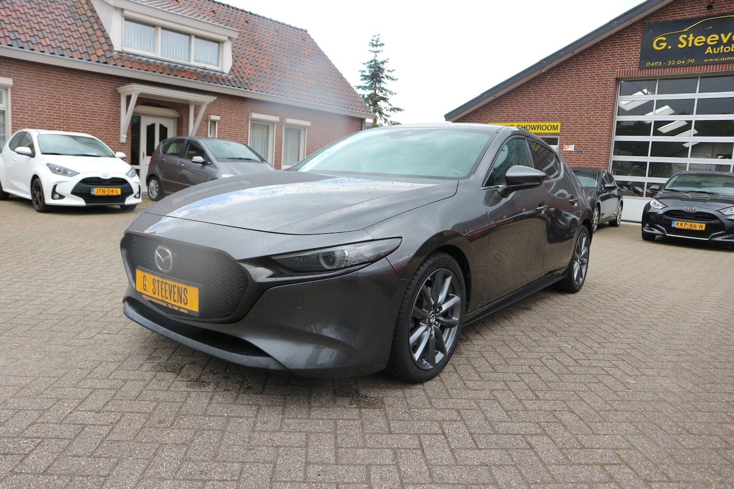Mazda 3 - 2.0 e-SkyActiv-G M Hybrid 122 Luxury navigatie,leder - AutoWereld.nl