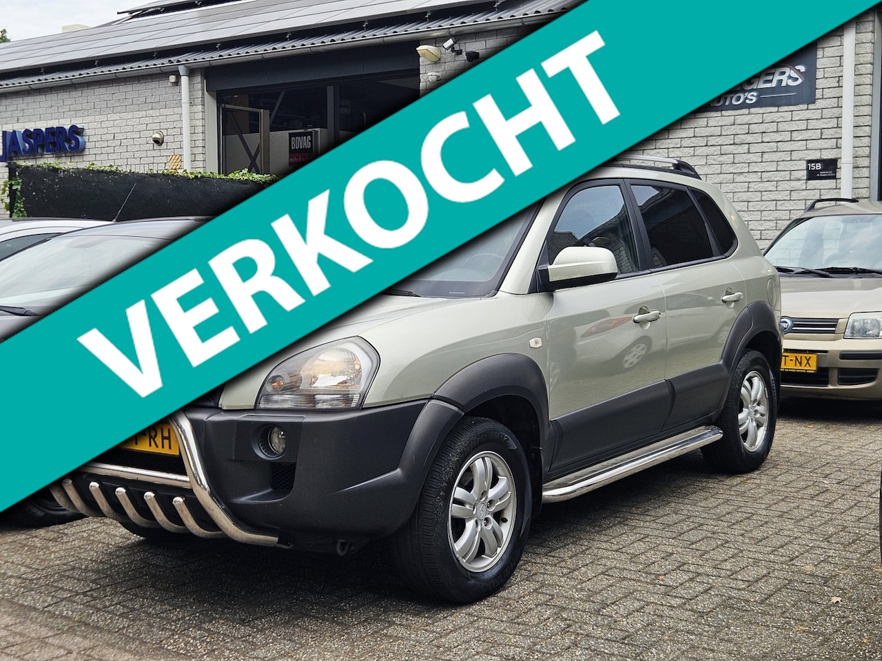 Hyundai Tucson - 2.0i Style*Airco*Cruise*Trekhaak*Nieuwe APK - AutoWereld.nl