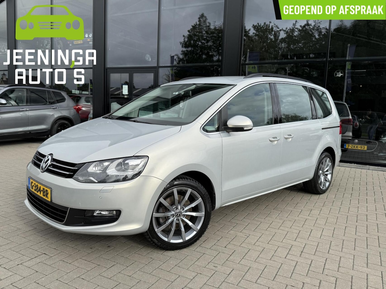 Volkswagen Sharan - 1.4 TSI Highline 7p. |PDC|Navi|ElektrischeTrekhaak|18" - AutoWereld.nl