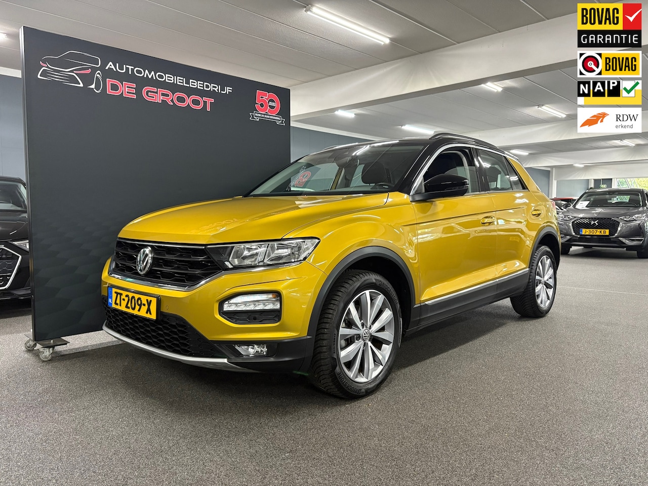 Volkswagen T-Roc - 1.0 TSI Style/ NL auto/ Parkeersensoren/ Navi/ LMV - AutoWereld.nl
