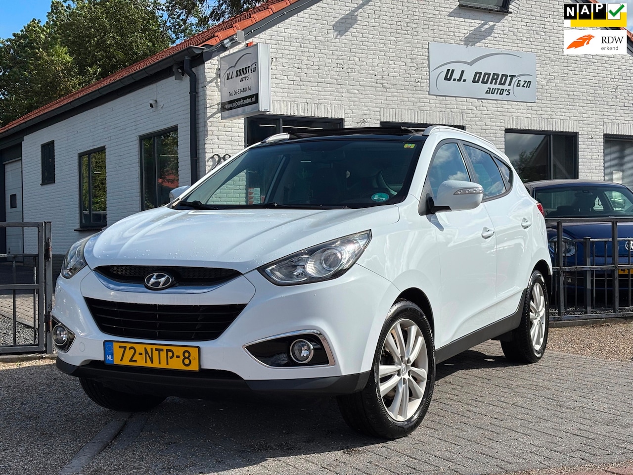 Hyundai ix35 - 2.0i i-Catcher schuif/kanteldak/stoelverwarming/netjes ! - AutoWereld.nl