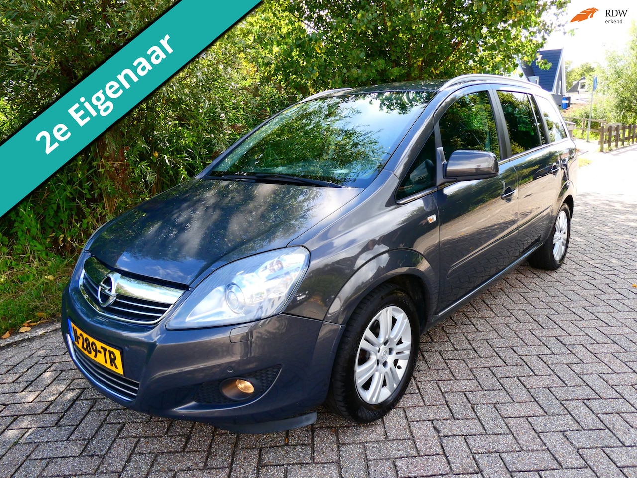 Opel Zafira - 1.8 Cosmo 140pk 7-Persoons Clima Cruise Navi Trekhaak 1200kg. Xenon - AutoWereld.nl