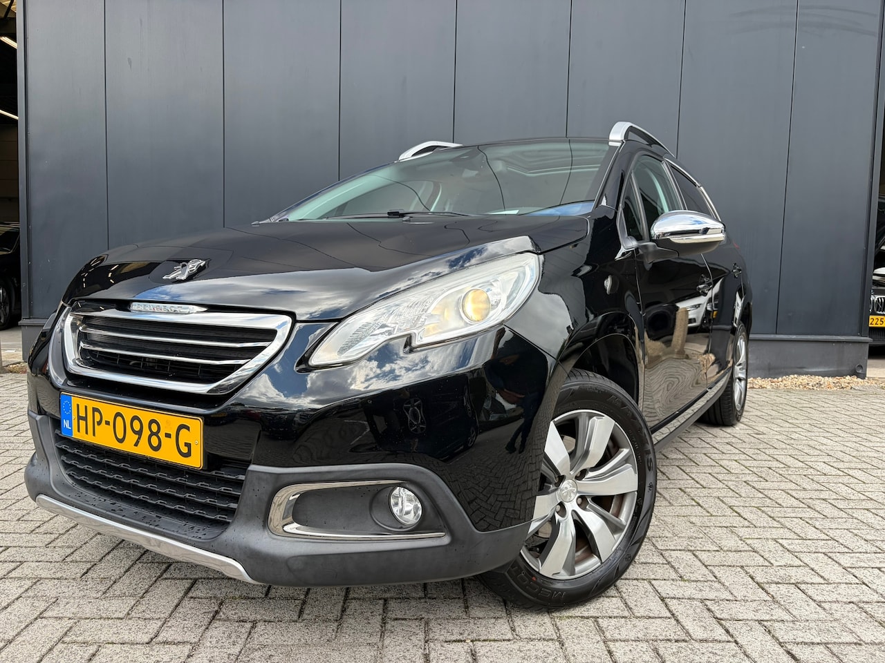 Peugeot 2008 - 1.2 Allure '15 Panodak/Leer/Lm/Clima/Nap - AutoWereld.nl
