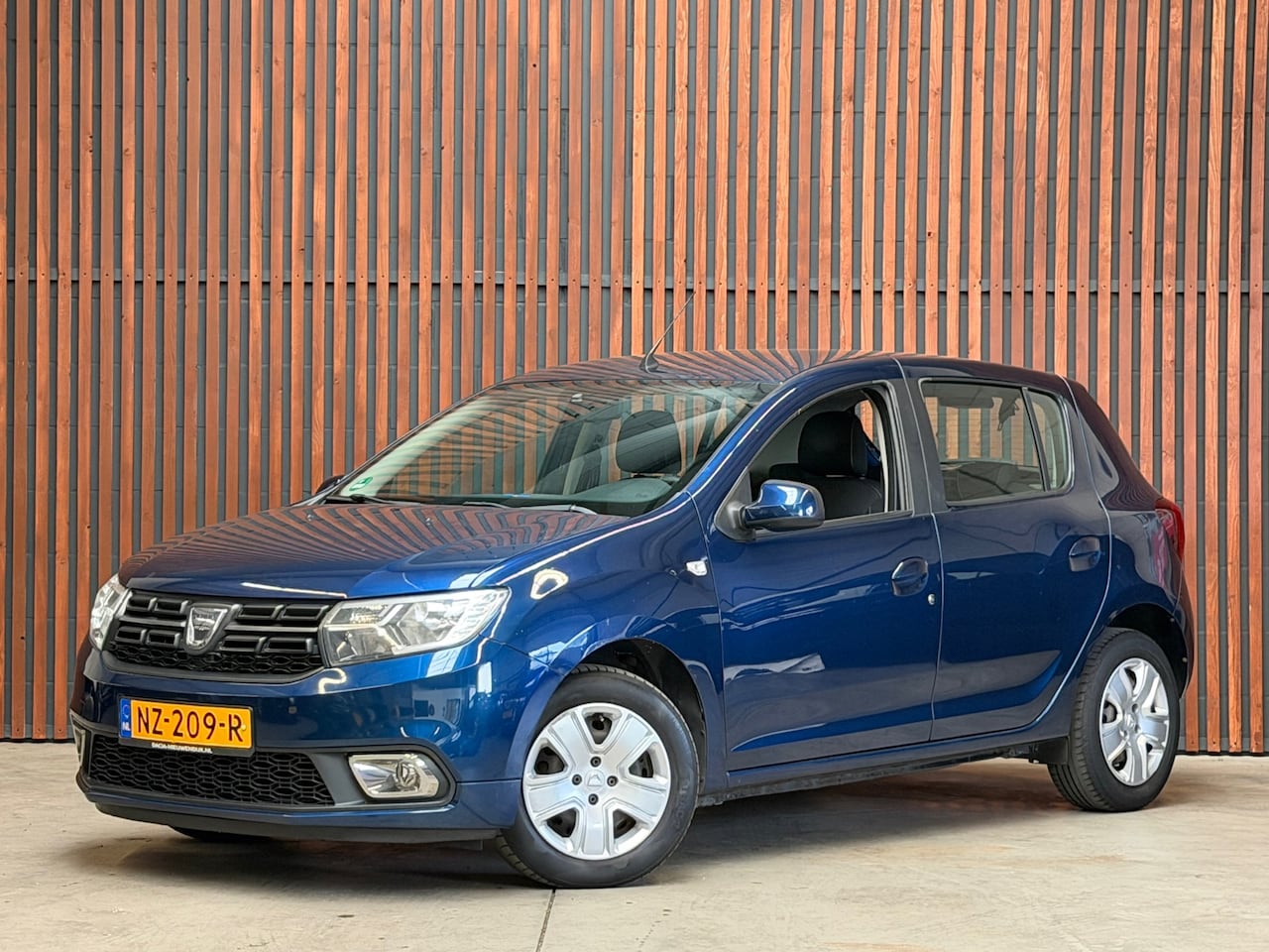 Dacia Sandero - 0.9 TCe Bi-Fuel Laureate Airco-Cruise-Radio/BT-NL Auto-NAP - AutoWereld.nl