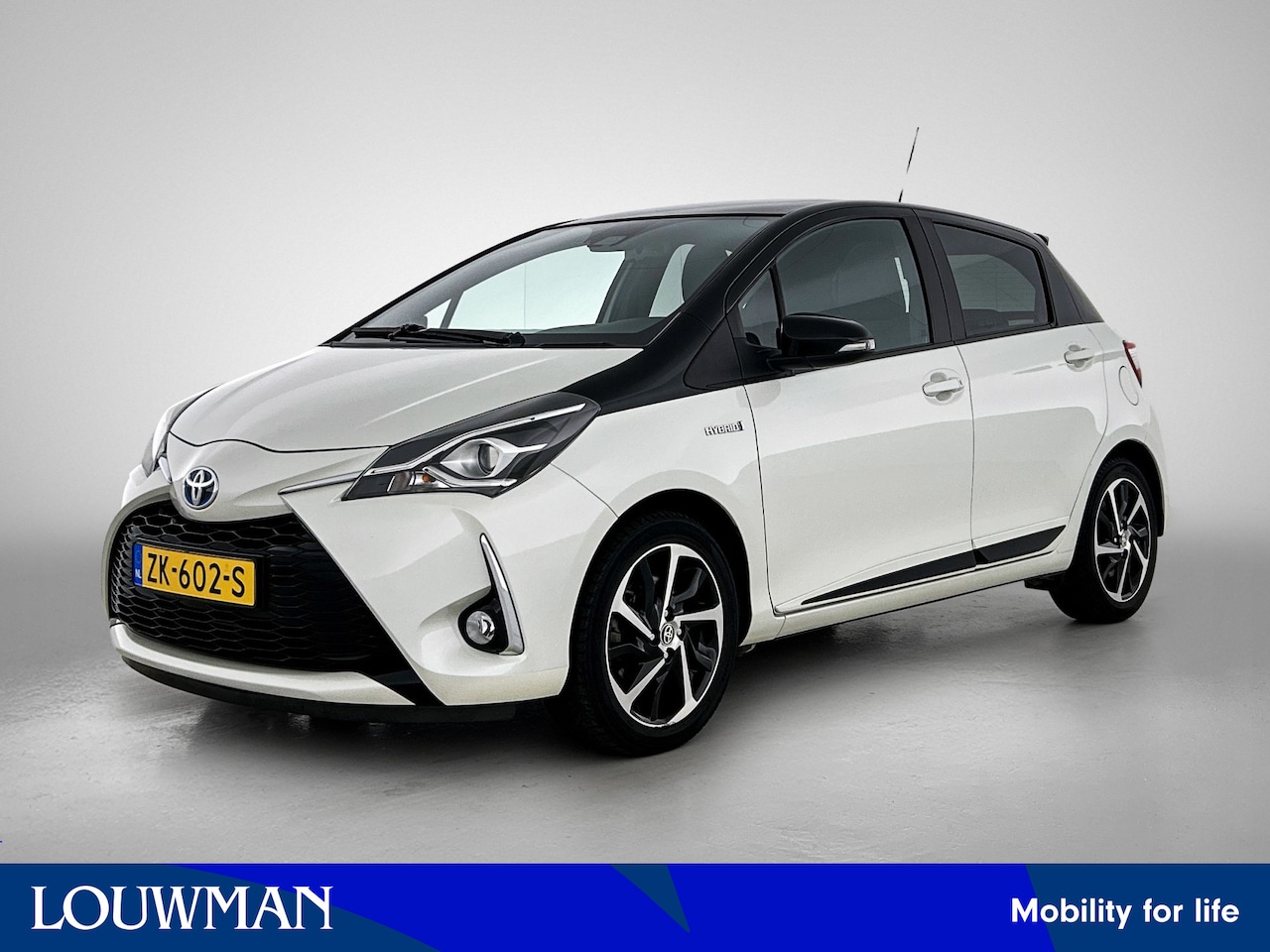 Toyota Yaris - 1.5 Hybrid Executive Bi-Tone | Dealer onderhouden | Panoramadak | Navigatie | Climate Cont - AutoWereld.nl