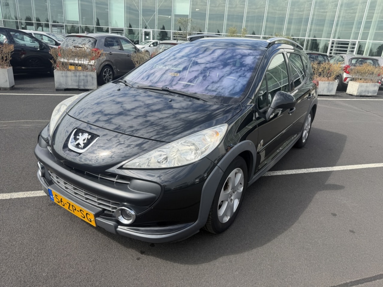 Peugeot 207 SW Outdoor - 1.6 VTi XS 1.6 VTi XS - AutoWereld.nl