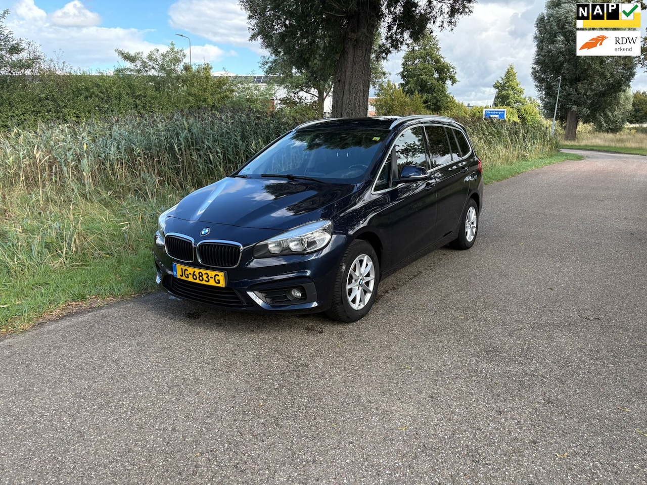 BMW 2-serie Gran Tourer - 218i Essential 7p. 1e Eigenaar Airco Cruise Navi Trekhaak Pdc - AutoWereld.nl