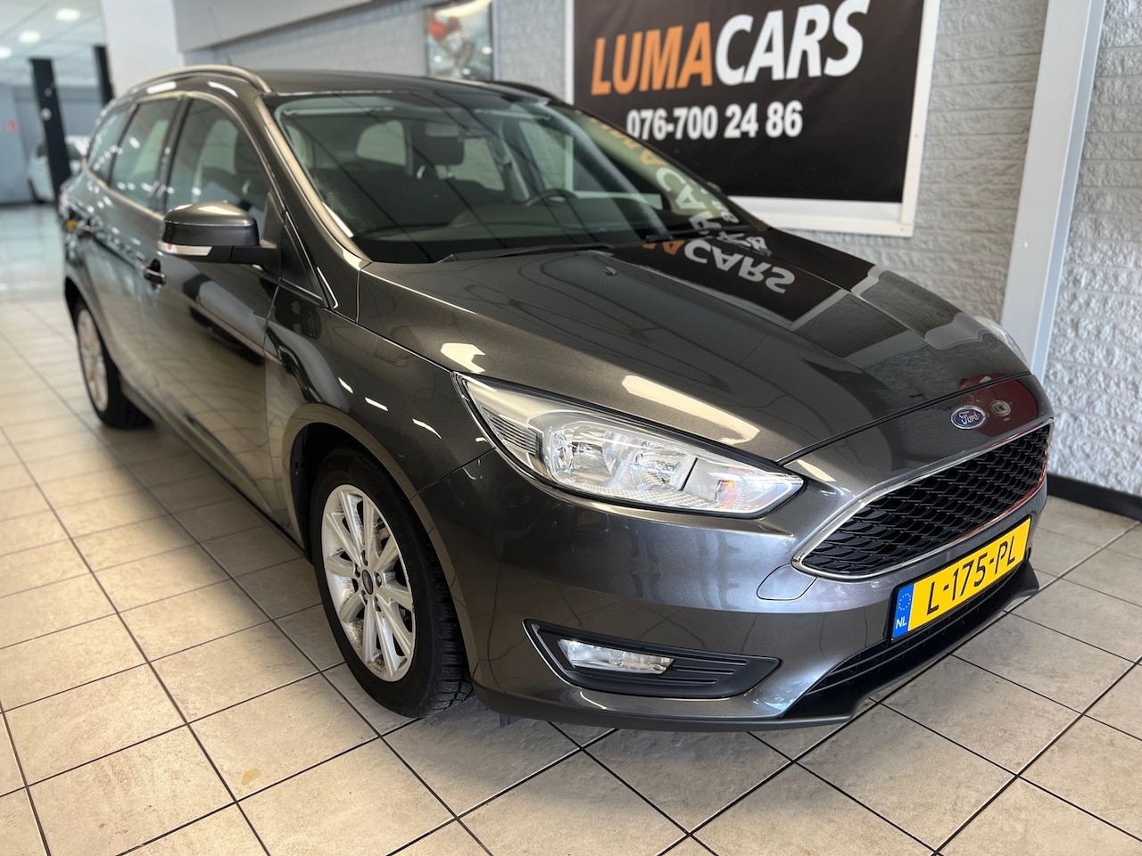 Ford Focus Wagon - 1.0 Titanium | Nieuwe APK | Navi | Cruise | - AutoWereld.nl