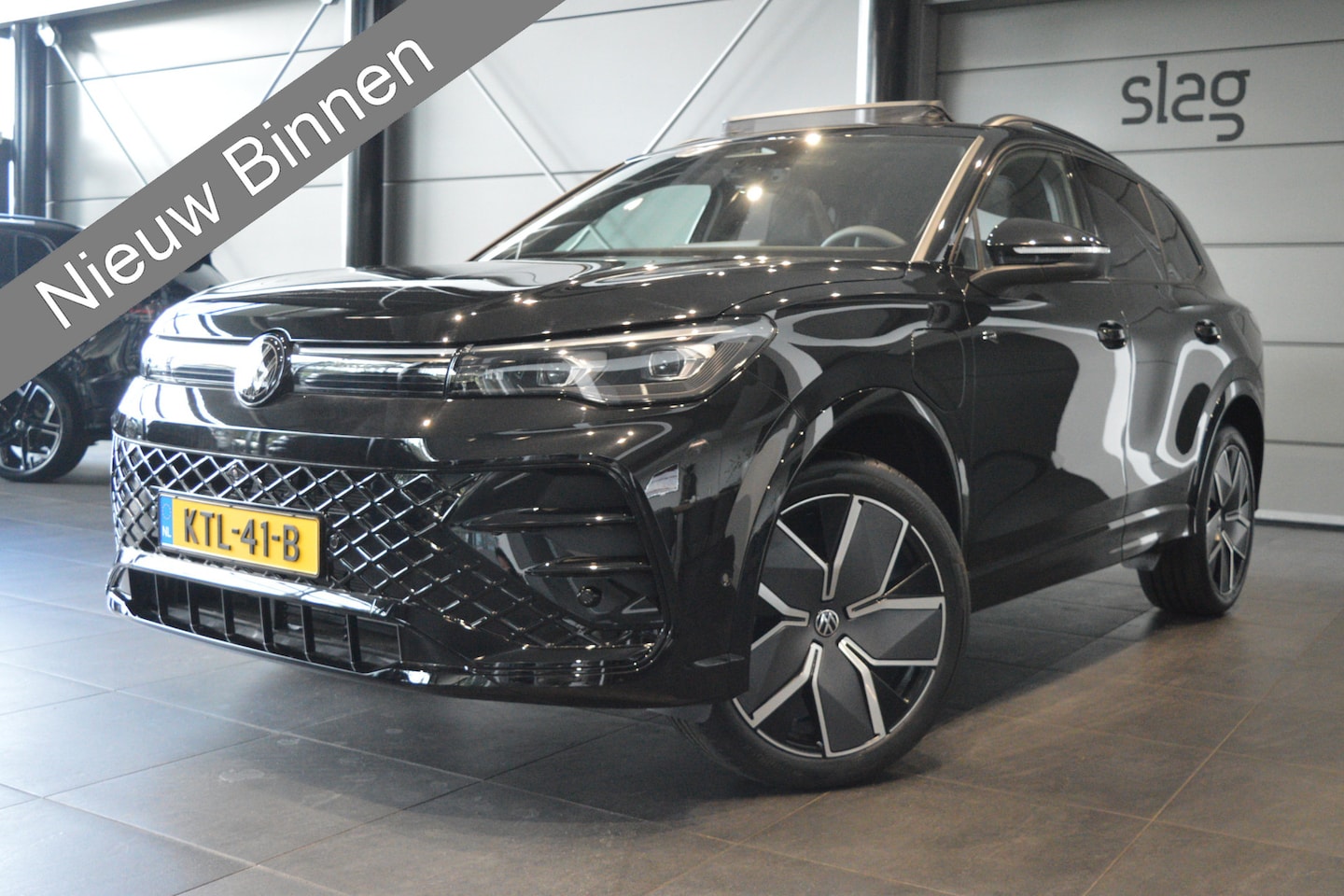 Volkswagen Tiguan - 1.5 eHybrid 3X R-Line Black Style head up pano 20 inch 272 pk !! - AutoWereld.nl