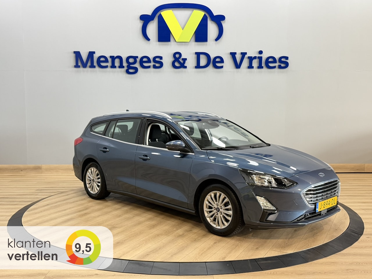 Ford Focus Wagon - 1.0 EcoBoost Titanium Business Airco ECC | Stuur\Stoel Verwarming | Camera | Keyless | Ada - AutoWereld.nl
