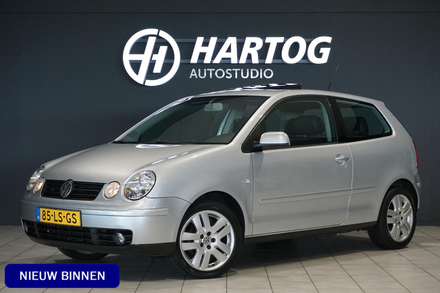 Volkswagen Polo - 1.4-16V Highline Automaat + PANO / LEDER / CLIMATE CONTROL / PDC / STOELVERWARMING - AutoWereld.nl