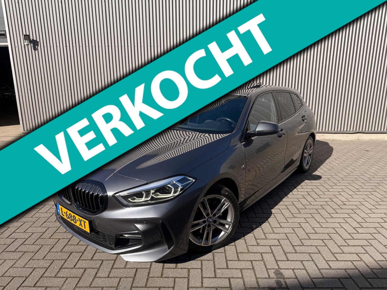 BMW 1-serie - 118i Business Edition M-Pakket|Spoiler|Carplay|NAP - AutoWereld.nl